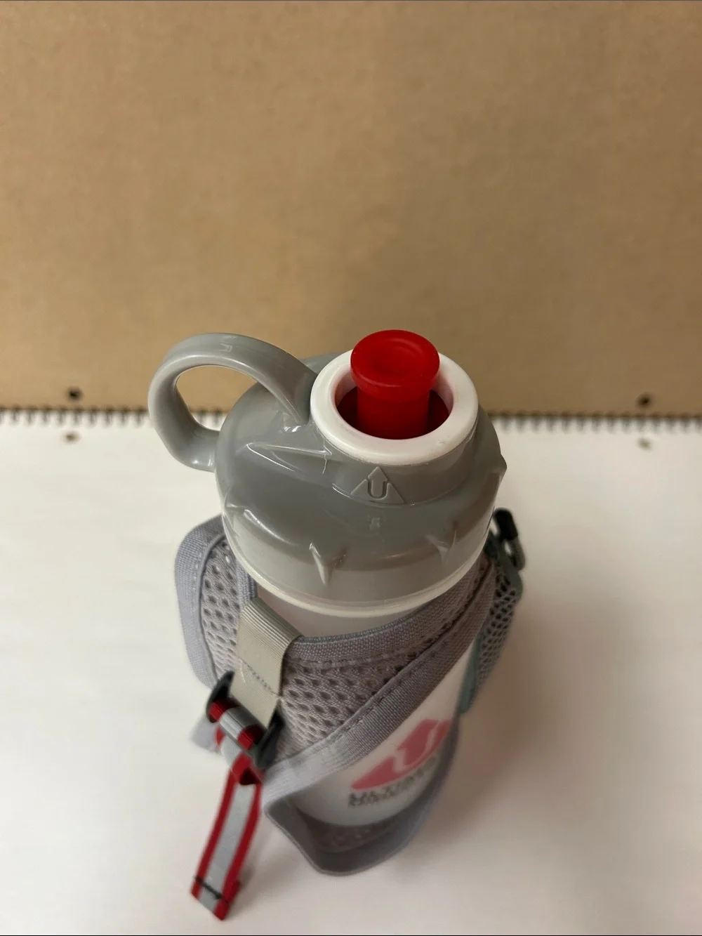 Ultimate Direction White & Red Hand Bottle with Adjustable Strap